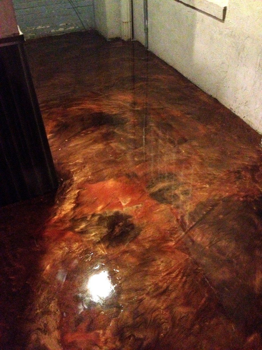 Copper and amber metallic floor in a hallway
