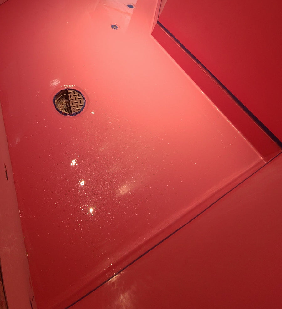 High-gloss coral metallic floor with coved base