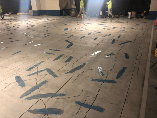StitchDog stitches installed across cracks on a Hawaii parking structure